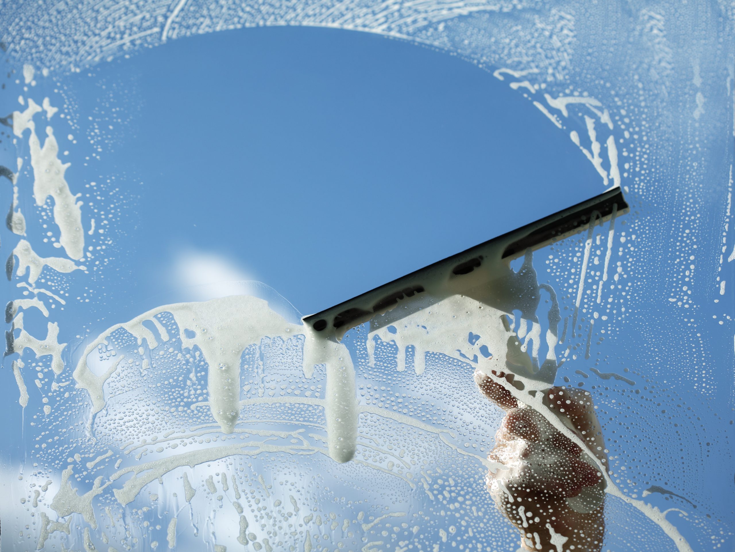 window cleaning with squeegee